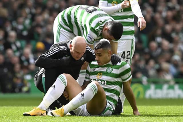 Celtic's Giorgos Giakoumakis goes down injured in the 7-0 win over St Johnstone. (Photo by Rob Casey / SNS Group)