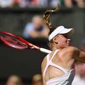 Kazakhstan's Elena Rybakina returns the ball to Romania's Simona Halep  during their women's singles semi final tennis match on the eleventh day of the 2022 Wimbledon Championships at The All England Tennis Club in Wimbledon, southwest London, on July 7, 2022. (Photo by Glyn KIRK / AFP) / RESTRICTED TO EDITORIAL USE (Photo by GLYN KIRK/AFP via Getty Images)