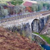 An 80ft-long section of the bridge parapet collapsed on Friday. Picture: Network Rail
