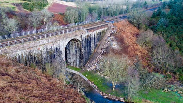 An 80ft-long section of the bridge parapet collapsed on Friday. Picture: Network Rail