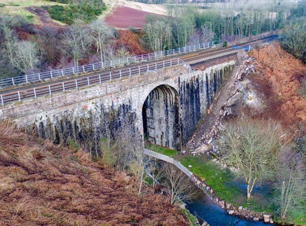 An 80ft-long section of the bridge parapet collapsed on Friday. Picture: Network Rail