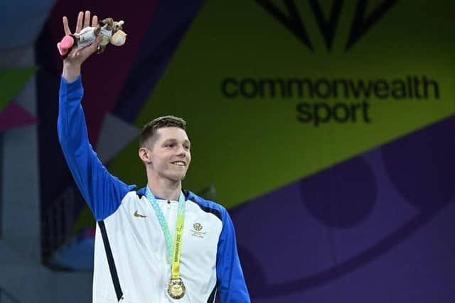 Scotland's Duncan Scott struck gold in the men's 200m freestyle swimming event on day two of the Commonwealth Games in Birmingham.