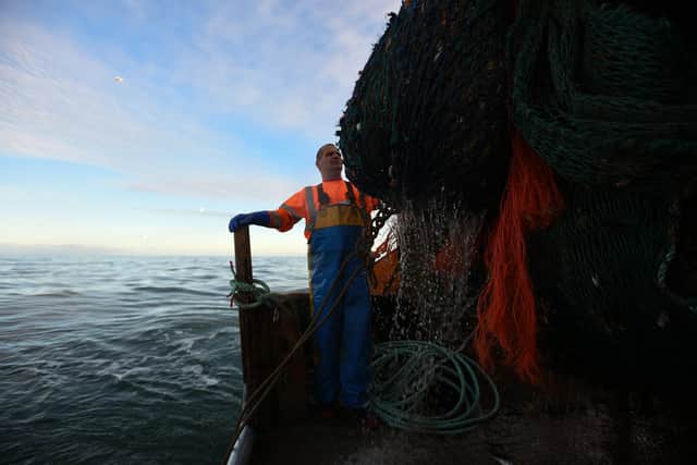 Skipper Andy Brown works fishing for prawns on the fishing trawler 'Scotia Star' in the North Sea off the east coast of Scotland. Picture: Andy Buchanan/AFP