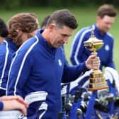Padraig Harrington holds the Ryder Cup during a team photo prior to the 43rd Ryder Cup at Whistling Straits. Picture: Warren Little/Getty Images.