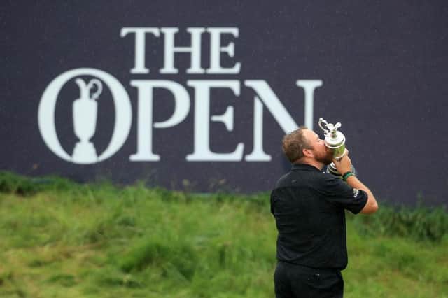 Shane Lowry celebrates with the Claret Jug after winning the 2019 Open at Royal Portrush. Picture: Andrew Redington/Getty Images.