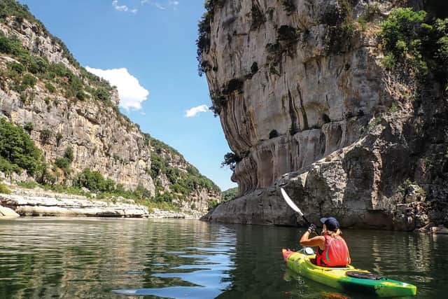 Kayaking is a popular way to see the Gorges de l’Ardèche, and is one of the journeys covered in Take the Slow Road: France by Martin Dorey.