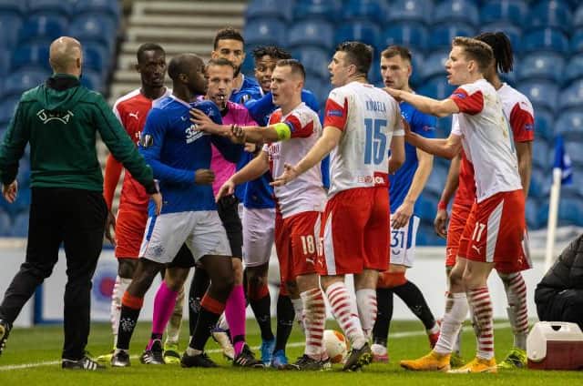 Rangers midfielder Glen Kamara reacts furiously to a comment from Slavia Prague's Ondrej Kudela in the closing stages of the Europa League match at Ibrox. (Photo by Alan Harvey / SNS Group)