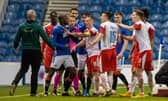 Rangers midfielder Glen Kamara reacts furiously to a comment from Slavia Prague's Ondrej Kudela in the closing stages of the Europa League match at Ibrox. (Photo by Alan Harvey / SNS Group)