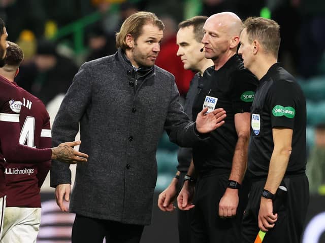 Hearts manager Robbie Neilson protests with linesman Alan Mulvanny at full time. (Photo by Alan Harvey / SNS Group)