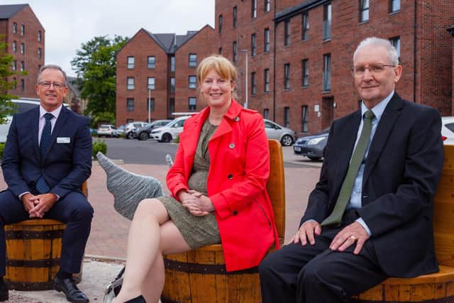 Allan Murphy, chief executive, Dunbritton Housing Association; Shona Robison; Alistair Tuach, vice-chair, Dunbritton Housing Association. Picture: Andy McKay Photography