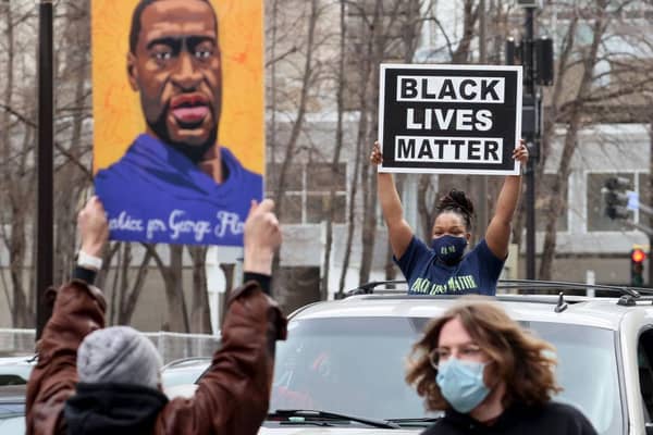 People in Minneapolis react after the verdict was read in the Derek Chauvin trial (Photo: Scott Olson/Getty Images)