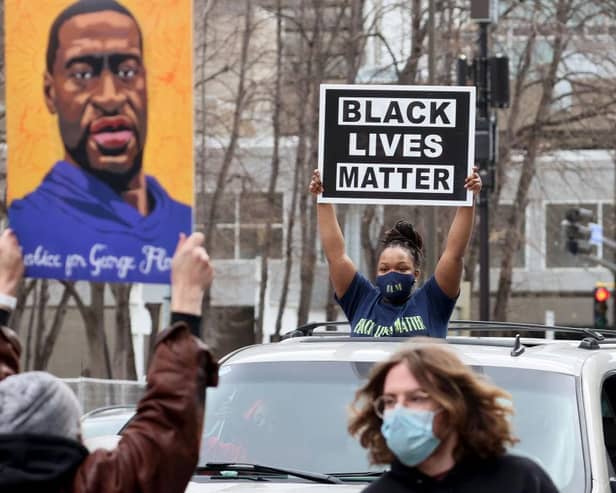 People in Minneapolis react after the verdict was read in the Derek Chauvin trial (Photo: Scott Olson/Getty Images)