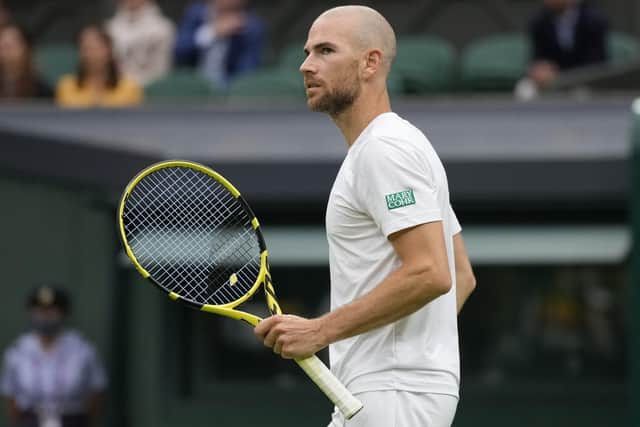 Adrian Mannarino of France gave Federer a scare before having to retire hurt