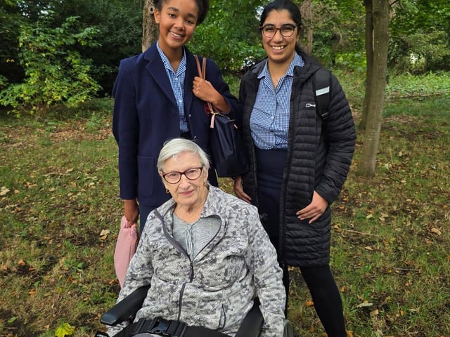 Children from St George’s School and resident from HC-One Scotland’s Murrayfield House Care Home taking a walk