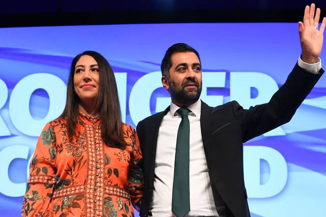 First Minister Humza Yousaf (right), flanked by his wife Nadia El-Nakla (left), at the SNP conference in Aberdeen in October last year. Picture: Andy Buchanan/AFP via Getty Images