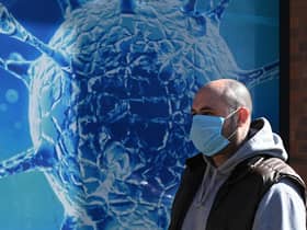 Wearing a Covid face mask in public places is once again a good idea (Picture: Oli Scarff/AFP via Getty Images)