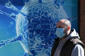 Wearing a Covid face mask in public places is once again a good idea (Picture: Oli Scarff/AFP via Getty Images)
