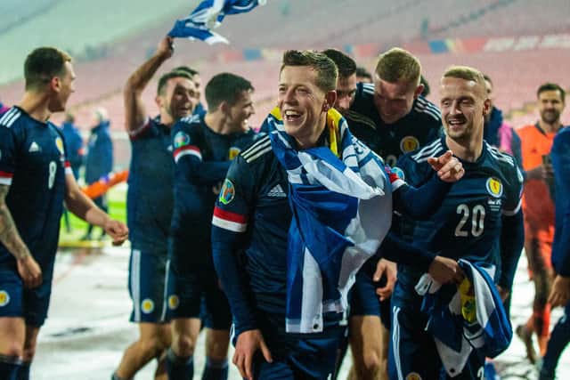 BELGRADE, SERBIA - NOVEMBER 12: Scotland's Callum McGregor and Leigh Griffiths (right) celebrate at full time during the UEFA Euro 2020 Qualifier between Serbia and Scotland at the Stadion Rajko Mitic on November 12, 2020, in Belgrade, Serbia. (Photo by Nikola Krstic / SNS Group)
