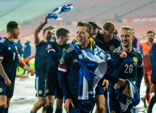 BELGRADE, SERBIA - NOVEMBER 12: Scotland's Callum McGregor and Leigh Griffiths (right) celebrate at full time during the UEFA Euro 2020 Qualifier between Serbia and Scotland at the Stadion Rajko Mitic on November 12, 2020, in Belgrade, Serbia. (Photo by Nikola Krstic / SNS Group)