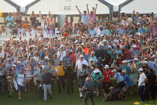 Fans cheers Phil Mickelson as he walks up the 18th fairway during the final round of the US PGA Championship at Kiawah Island, where there was little sign of social distancing. Picture: Jamie Squire/Getty Images
