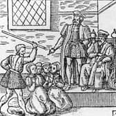 A group of supposed witches being beaten in front of King James I (King James VI of Scotland) around 1610