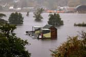 Ceann a' Ghiùthsaich sa Ghàidhealtachd fo bhurn às dèidh na tuiltean uamhasach. (Dealbh: Jeff Mitchell/Getty Images)