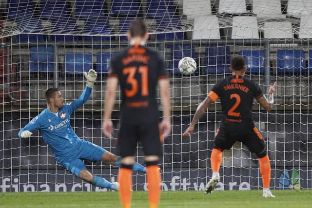 Rangers captain James Tavernier opens the scoring from the penalty spot in his team's 4-0 Europa League win against Willem II in Tilburg (Photo by JEROEN PUTMANS/ANP/AFP via Getty Images)