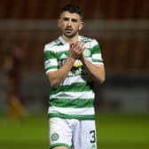 Greg Taylor applauds the Celtic fans after the 4-0 win over Motherwell at Fir Park. (Photo by Ross MacDonald / SNS Group)