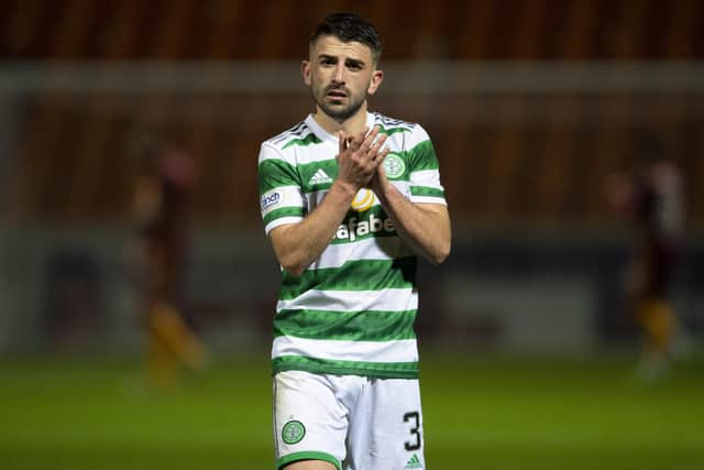 Greg Taylor applauds the Celtic fans after the 4-0 win over Motherwell at Fir Park. (Photo by Ross MacDonald / SNS Group)