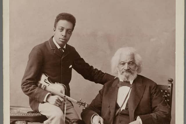 Frederick Douglass, seated, and his son Joseph.