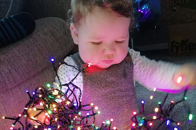 Jess May Cowgill shared this photo of her baby helping to sort out the lights.
