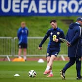 Andy Robertson trains with Scotland, watched by head coach Steve Clarke, at Stadion am Groben in Garmisch-Partenkirchen, Germany. Pic: Andrew Milligan/PA Wire.