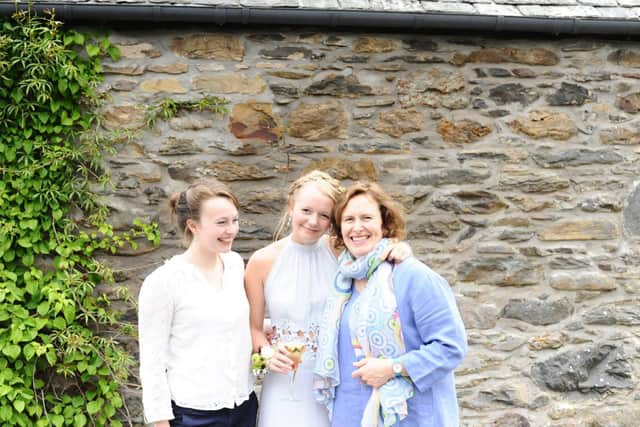 Flora Shedden, her sister, Hebe , and mum