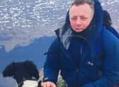 Neil Gillingham with his dog.