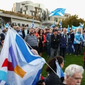 Supporters of Indyref2 attend a rally arranged by Believe in Scotland outside the Scottish Parliament  on 18 September (Picture: Jeff J Mitchell/Getty Images)