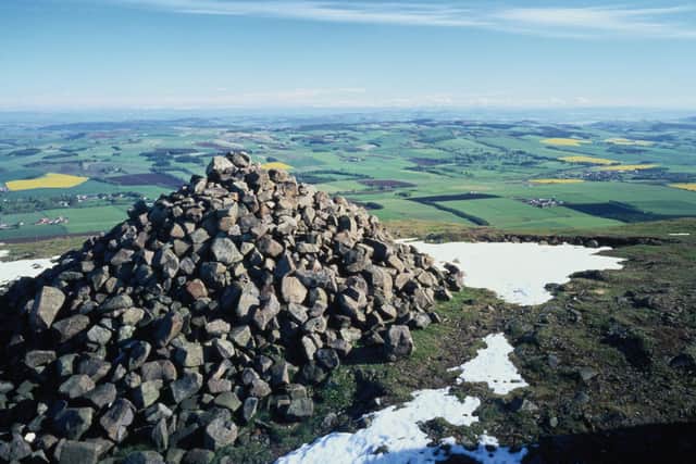 Cairn on the summit of West Lomond, Fife. "Cairns are ambiguous; unbodied graves marking the had-been-here, signs indicating where you are and might go." PIC: RDImages/Epics/Getty Images