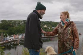 Greg Hemphill and Julie Wilson Nimmo in Tobermory with their dog, Bonnie Pic: Solus Productions/BBC