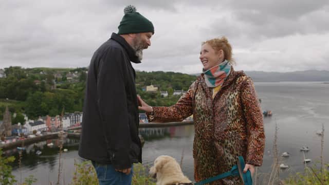 Greg Hemphill and Julie Wilson Nimmo in Tobermory with their dog, Bonnie Pic: Solus Productions/BBC