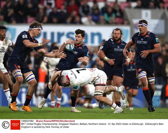 Edinburgh's Blair Kinghorn is tackled by Nick Tomney of Ulster during the match in Belfast. Pic: Bryan Keane/INPHO/Shutterstock