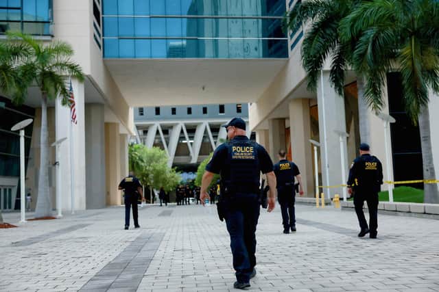 Department of Homeland Security police patrol the Miami court where Donald Trump will appear on Tuesday. Picture: Joe Raedle/Getty