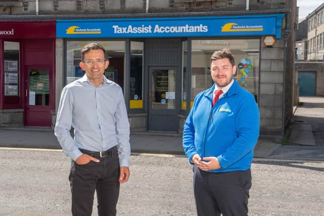 Steven Mearns (left) with Inverurie branch staff member, Barry McCabe. Picture: Michal Wachucik/Abermedia