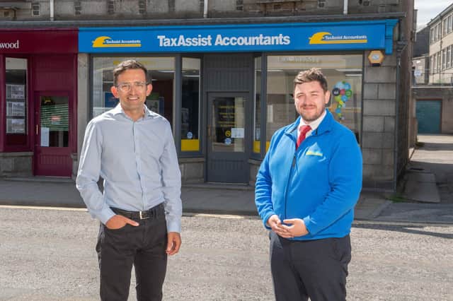 Steven Mearns (left) with Inverurie branch staff member, Barry McCabe. Picture: Michal Wachucik/Abermedia