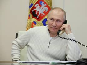 Russian president Vladimir Putin speaks on the phone. Picture: Mikhail Klimentyev, Sputnik, Kremlin Pool Photo via AP