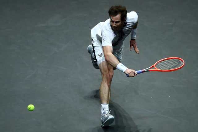 Andy Murray returns a backhand in his match against Andrey Rublev in the 48th ABN AMRO World Tennis Tournament in Rotterdam. (Photo by Dean Mouhtaropoulos/Getty Images)