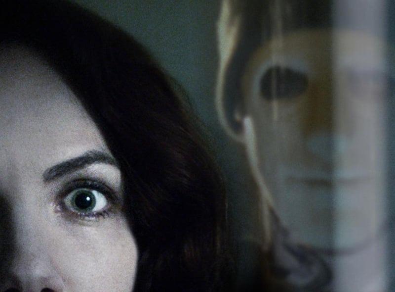 Hush is a slasher film that follows deaf writer who retreats into the woods to live a solitary life only to discover she must fight for her life in silence when a masked killer appears in her window.