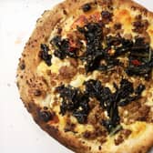 Pizza from Wood Oven wonders winter special of bianca pork and fennel sausage