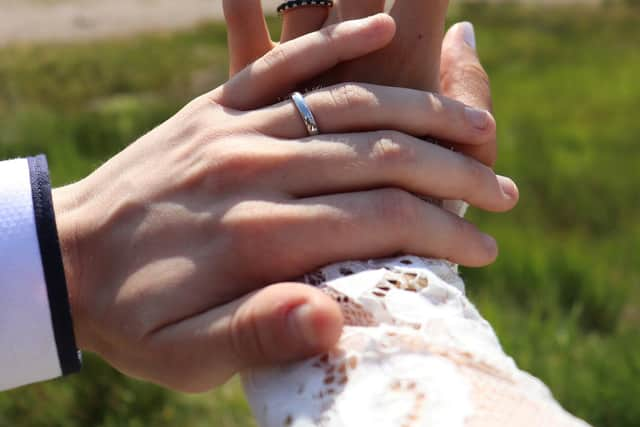 Sammy wore a white gown while Teri wore a tartan suit for the big day.