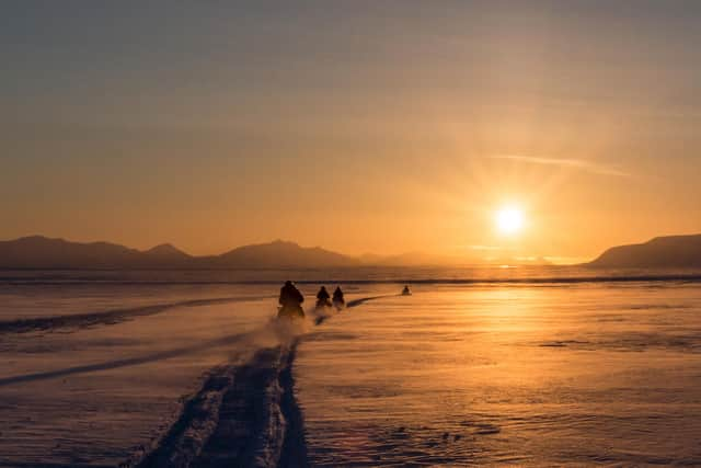 A snowmobile safari across Svalbard in winter.