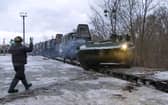 A Russian armoured vehicle drives off a railway platform after arrival in Belarus. Picture: Russian Defense Ministry Press Service via AP