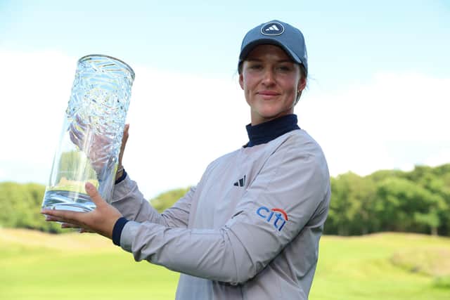 Swede Linn Grant shows off the trophy after winning the Volvo Car Scandinavian Mixed at Vasatorps Golfklubb in her homwtown of Helsingborg. Picture: Luke Walker/Getty Images.